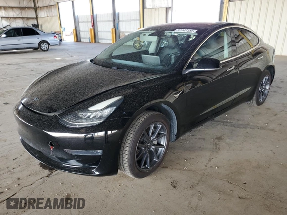 2018 Tesla Model 3 Long Range Battery with VIN 5YJ3E1EA6JF011383, listed as a Copart auction lot 51147185 with 148,507 mi miles and Clean Title. Bid and sale history available at DreamBid. Image 1.