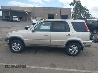 2001 Honda CR-V SE with VIN JHLRD18791C000245, listed as a IAAI auction lot 41910546 with 140,712 mi miles. Bid and sale history available at carsss.com. Image 14.