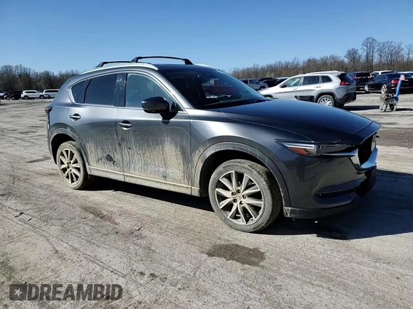 2018 Mazda CX-5 Grand Touring with VIN JM3KFBDM2J0407164, listed as a Copart auction lot 50080345 with 126,464 mi miles and Salvage title. Bid and sale history available at DreamBid. Image 12.