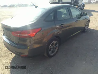2017 Ford Focus SE with VIN 1FADP3FE3HL295192, listed as a IAAI auction lot 42664709 with 47,589 mi miles and . Bid and sale history available at DreamBid. Image 4.
