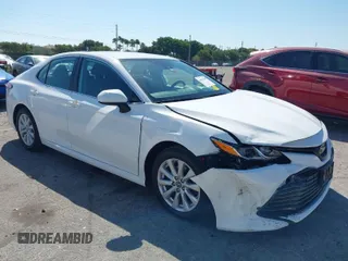2020 Toyota Camry LE with VIN 4T1C11AK0LU318449, listed as a IAAI auction lot 41879703 with 74,800 mi miles. Bid and sale history available at carsss.com. Image 1.