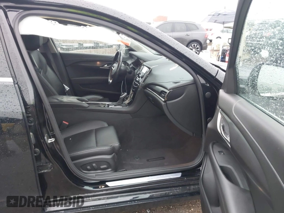 2014 Cadillac ATS Standard RWD with VIN 1G6AA5RX7E0112352, listed as a IAAI auction lot 42487515 with 98,009 mi miles and . Bid and sale history available at DreamBid. Image 5.