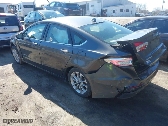 2019 Ford Fusion Hybrid SE with VIN 3FA6P0LU1KR235021, listed as a IAAI auction lot 41660786 with 93,331 mi miles. Bid and sale history available at carsss.com. Image 3.