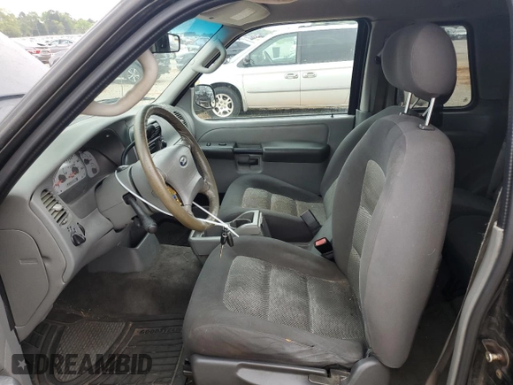 2003 Ford Explorer Sport XLS with VIN 1FMYU60E53UC04632, listed as a Copart auction lot 51465055 with 217,732 mi miles and Salvage title. Bid and sale history available at DreamBid. Image 7.