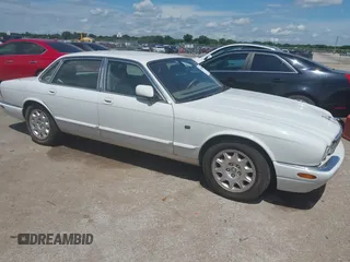 2003 Jaguar XJ 8 with VIN SAJDA14C03LF52338, listed as a IAAI auction lot 42684038 with 142,107 mi miles and . Bid and sale history available at DreamBid. Image 1.