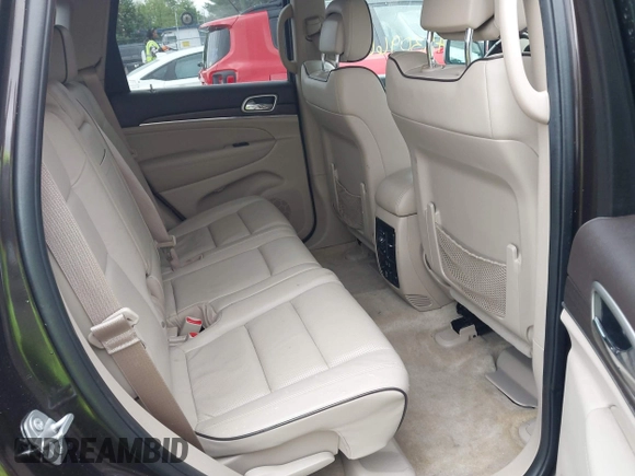 2017 Jeep Grand Cherokee Overland z VIN 1C4RJFCG7HC800403, wystawiony jako IAAI lot #42309664 z przebiegiem 98 389 mil mil oraz . Historia ofert i sprzedaży dostępna na DreamBid. Obrazek 8.