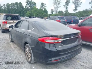2017 Ford Fusion SE with VIN 3FA6P0HD0HR351408, listed as a IAAI auction lot 42690906 with 148,273 mi miles and . Bid and sale history available at DreamBid. Image 3.