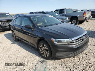 2021 Volkswagen Jetta SEL z VIN 3VWE57BU5MM013374, wystawiony jako Copart lot #62359125 z przebiegiem 50 969 mil mil oraz Czysty tytuł • Clean title. Historia ofert i sprzedaży dostępna na DreamBid. Obrazek 4.