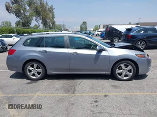 2012 Acura TSX Technology z VIN JH4CW2H67CC003799, wystawiony jako IAAI lot #42171355 z przebiegiem 124 184 mil mil oraz . Historia ofert i sprzedaży dostępna na DreamBid. Obrazek 14.