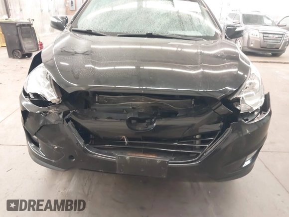 2013 Hyundai Tucson GLS with VIN KM8JU3AC8DU557445, listed as a IAAI auction lot 41839782 with 153,769 mi miles. Bid and sale history available at carsss.com. Image 6.