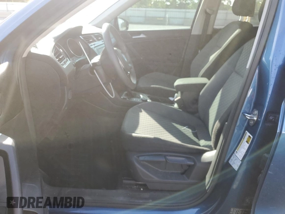 2018 Volkswagen Tiguan S with VIN 3VV0B7AX2JM019924, listed as a Copart auction lot 56138375 with 76,798 mi miles and Salvage title. Bid and sale history available at DreamBid. Image 7.