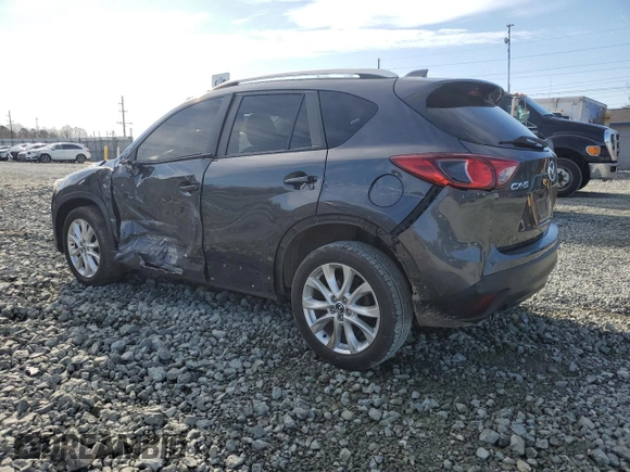 2014 Mazda CX-5 Grand Touring with VIN JM3KE2DY4E0323603, listed as a Copart auction lot 49884835 with 0 mi miles and Salvage Title. Bid and sale history available at carsss.com. Image 2.