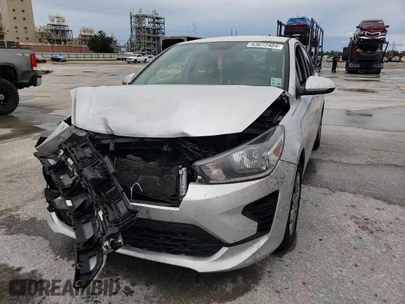 2022 Kia Rio LX with VIN 3KPA24AD2NE506127, listed as a Copart auction lot 63672404 with Not Provided miles and Salvage Title. Bid and sale history available at DreamBid. Image 11.