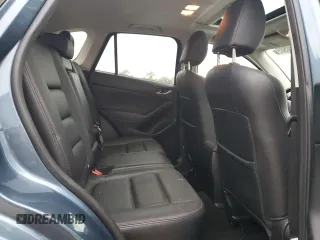 2015 Mazda CX-5 Grand Touring with VIN JM3KE2DY4F0526671, listed as a Copart auction lot 46520505 with 129,017 mi miles and Salvage Title. Bid and sale history available at carsss.com. Image 11.
