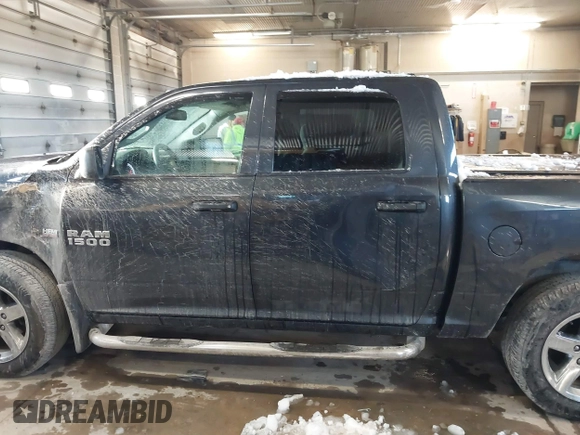 2014 Ram 1500 Express z VIN 1C6RR7KT7ES178021, wystawiony jako IAAI lot #41866157 z przebiegiem 74 301 mil mil oraz . Historia ofert i sprzedaży dostępna na DreamBid. Obrazek 14.
