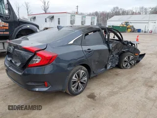 2016 Honda Civic EX-L z VIN 19XFC1F73GE033247, wystawiony jako IAAI lot #41910941 z przebiegiem Nie podano mil oraz . Historia ofert i sprzedaży dostępna na DreamBid. Obrazek 4.