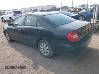2003 Toyota Camry LE with VIN 4T1BE32K33U176270, listed as a IAAI auction lot 41995146 with 223,032 mi miles and . Bid and sale history available at DreamBid. Image 3.