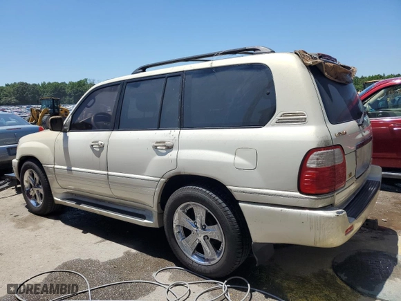 2001 Lexus LX 470 with VIN JTJHT00W613501194, listed as a Copart auction lot 58038914 with 312,193 mi miles and Salvage Title. Bid and sale history available at carsss.com. Image 2.
