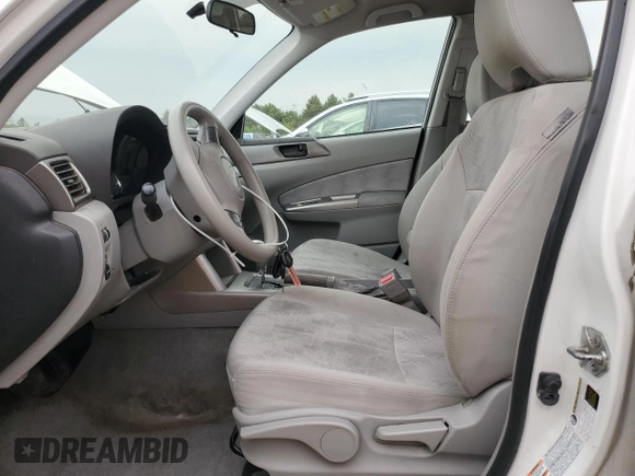 2010 Subaru Forester X with VIN JF2SH6BC1AH907730, listed as a Copart auction lot 58852705 with 144,283 mi miles and Salvage title. Bid and sale history available at DreamBid. Image 7.