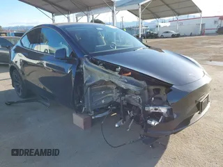 2024 Tesla Model Y with VIN 7SAYGDED5RF103983, listed as a IAAI auction lot 41933836 with 11,398 mi miles and . Bid and sale history available at DreamBid. Image 1.