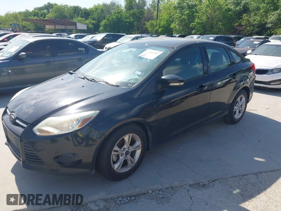 2013 Ford Focus SE with VIN 1FADP3F28DL302475, listed as a IAAI auction lot 42046024 with 110,446 mi miles. Bid and sale history available at carsss.com. Image 2.