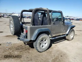 2006 Jeep Wrangler Rubicon with VIN 1J4FA69S36P744801, listed as a Copart auction lot 46541575 with 164,347 mi miles and Salvage title. Bid and sale history available at DreamBid. Image 3.