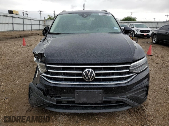 2023 Volkswagen Tiguan S with VIN 3VVRB7AX0PM038326, listed as a Copart auction lot 56350825 with 50,013 mi miles and Salvage title. Bid and sale history available at DreamBid. Image 5.
