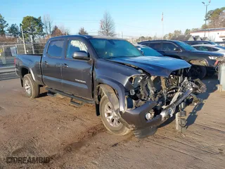 2019 Toyota Tacoma 4WD SR5 with VIN 3TMDZ5BNXKM057223, listed as a IAAI auction lot 41621122 with 71,503 mi miles. Bid and sale history available at carsss.com. Image 1.