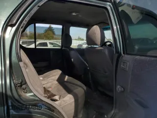 2004 Isuzu Rodeo S with VIN 4S2CK58W344303242, listed as a Copart auction lot 75339714 with 106,659 mi miles and Salvage title. Bid and sale history available at DreamBid. Image 12.