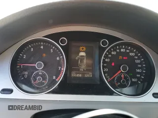 2009 Volkswagen Passat Komfort z VIN WVWJK73C49P049140, wystawiony jako Copart lot #53472005 z przebiegiem 193 458 mil mil oraz Szkoda całkowita • Salvage title. Historia ofert i sprzedaży dostępna na DreamBid. Obrazek 9.