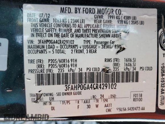 2012 Ford Fusion S with VIN 3FAHP0GA4CR429102, listed as a Copart auction lot 52608585 with 144,846 mi miles and Salvage Title. Bid and sale history available at carsss.com. Image 12.