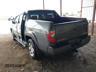 2007 Honda Ridgeline RTL z VIN 2HJYK16537H521608, wystawiony jako IAAI lot #42112626 z przebiegiem 197 076 mil mil oraz . Historia ofert i sprzedaży dostępna na DreamBid. Obrazek 3.