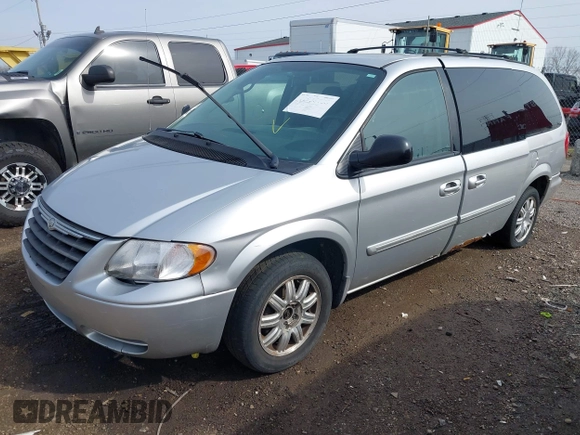 2006 Chrysler Town & Country Touring with VIN 2A4GP54L56R772868, listed as a IAAI auction lot 41935753 with 167,281 mi miles and . Bid and sale history available at DreamBid. Image 17.