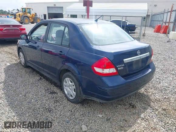 2011 Nissan Versa S with VIN 3N1BC1AP2BL408977, listed as a IAAI auction lot 42524102 with 195,285 mi miles and . Bid and sale history available at DreamBid. Image 3.