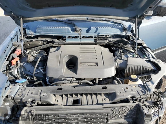 2023 Land Rover Defender SE with VIN SALEPEEU8P2115950, listed as a Copart auction lot 82717694 with 18,246 mi miles and Salvage title. Bid and sale history available at DreamBid. Image 12.