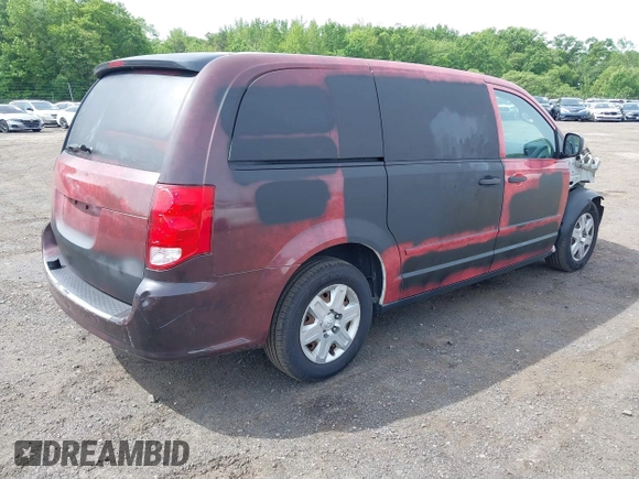 2013 Ram Cargo Van Tradesman with VIN 2C4JRGAG3DR735792, listed as a IAAI auction lot 42342661 with 82,676 mi miles and . Bid and sale history available at DreamBid. Image 4.