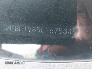 2012 Mazda 3 i Touring с VIN JM1BL1V85C1675345, выставлен на аукционе IAAI как лот 42261279 с пробегом 140 705 миль миль и . История ставок и продаж доступна на DreamBid. Изображение 9.