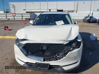 2019 Mazda CX-5 Touring with VIN JM3KFACM4K1668352, listed as a IAAI auction lot 41481291 with 65,901 mi miles and . Bid and sale history available at carsss.com. Image 12.