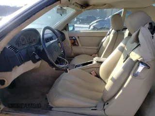 1990 Mercedes-Benz 500 z VIN WDBFA66E8LF010613, wystawiony jako Copart lot #47093275 z przebiegiem 120 814 mil mil oraz Szkody całkowita. Historia ofert i sprzedaży dostępna na DreamBid. Obrazek 7.