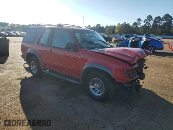 1999 Ford Explorer with VIN 1FMYU22E5XUC72067, listed as a Copart auction lot 79531894 with 109,134 mi miles and Salvage title. Bid and sale history available at DreamBid. Image 4.