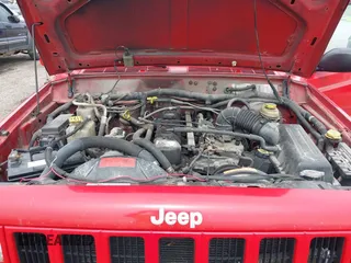 1999 Jeep Cherokee Sport with VIN 1J4FT68S6XL511158, listed as a IAAI auction lot 42170917 with 251,442 mi miles and . Bid and sale history available at DreamBid. Image 10.