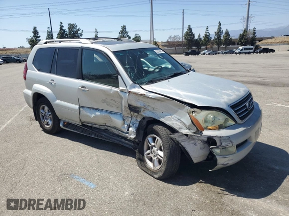 2004 Lexus GX 470 with VIN JTJBT20X640052213, listed as a Copart auction lot 52708415 with 390,451 mi miles and Salvage Title. Bid and sale history available at carsss.com. Image 4.