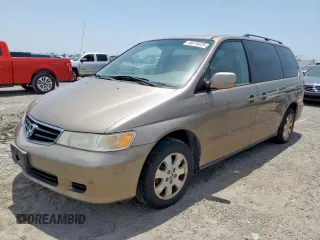 2004 Honda Odyssey EX-L z VIN 5FNRL18024B028057, wystawiony jako Copart lot #56678325 z przebiegiem Nie podano mil oraz Czysty tytuł • Clean title. Historia ofert i sprzedaży dostępna na DreamBid. Obrazek 1.