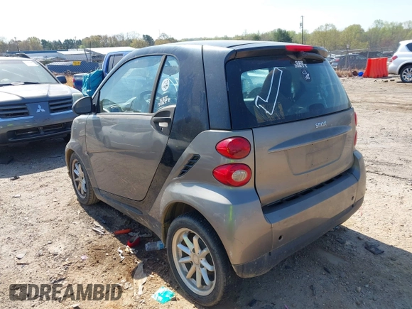 2009 Smart fortwo Pure z VIN WMEEJ31X99K302227, wystawiony jako IAAI lot #41900573 z przebiegiem 30 730 mil mil oraz . Historia ofert i sprzedaży dostępna na DreamBid. Obrazek 3.