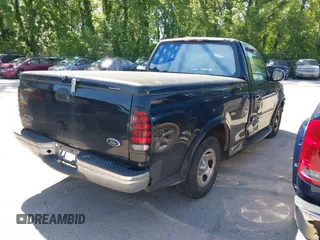 2000 Ford F-150 XL with VIN 1FTRF17L6YKA00872, listed as a IAAI auction lot 42195407 with 210,209 mi miles and . Bid and sale history available at DreamBid. Image 4.