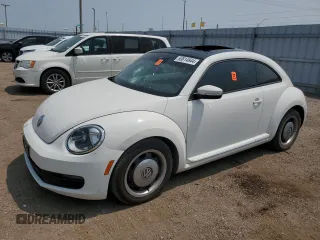 2013 Volkswagen Beetle with VIN 3VWHX7AT2DM656457, listed as a Copart auction lot 63814944 with 92,966 mi miles and Salvage Title. Bid and sale history available at DreamBid. Image 1.