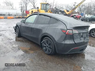 2025 Tesla Model Y Long Range with VIN 7SAYGDED6SF226035, listed as a IAAI auction lot 41102115 with Not Provided miles and . Bid and sale history available at DreamBid. Image 3.