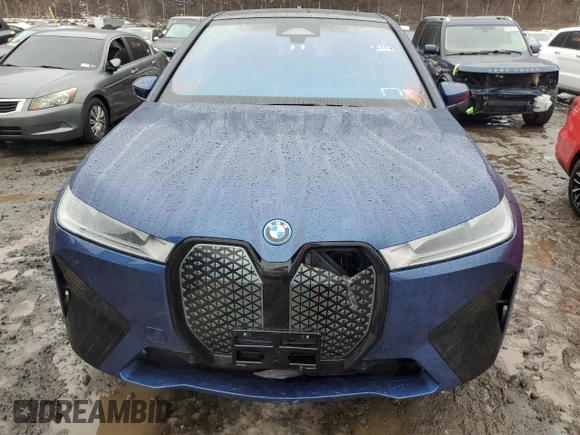 2023 BMW iX xDrive50 with VIN WB523CF09PCM04671, listed as a Copart auction lot 38947734 with 0 mi miles. Bid and sale history available at carsss.com. Image 5.
