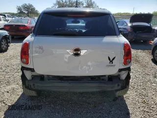 2011 MINI Countryman with VIN WMWZB3C56BWM00040, listed as a Copart auction lot 48660435 with 146,607 mi miles and Salvage title. Bid and sale history available at DreamBid. Image 6.