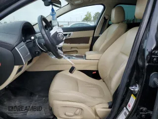 2013 Jaguar XF V6 SC with VIN SAJWJ0EF3D8S85693, listed as a Copart auction lot 75660304 with 70,565 mi miles and Salvage Title. Bid and sale history available at carsss.com. Image 7.